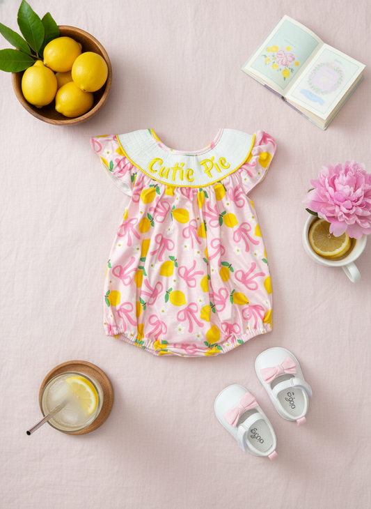 Cutie pie lemon bow smocked romper